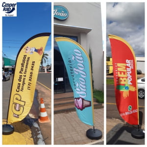 WIND BANNER confeccionado conforme a arte fornecida pelo CLIENTE  2,40m ou 2,80 altura por 0,70cm de largura com formato de Faca, ou, Pena, ou Curva 